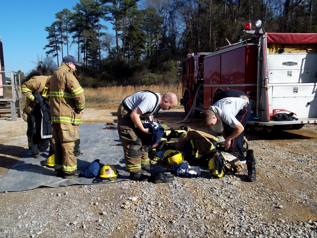 Group of Fire Suppression Team Working on the Road
